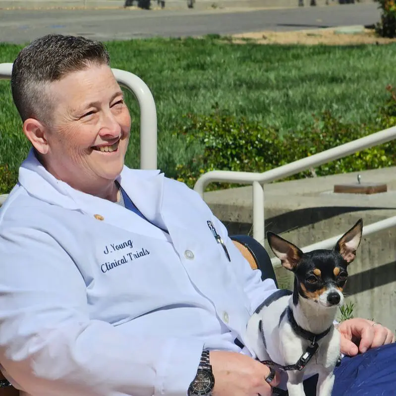 Happy person and dog outdoors together