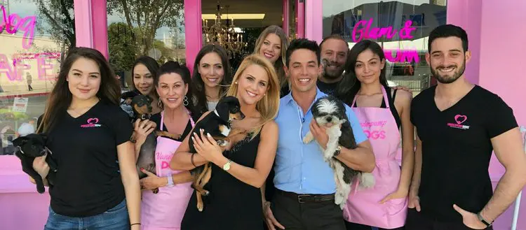 Group of people outside a dog cafe