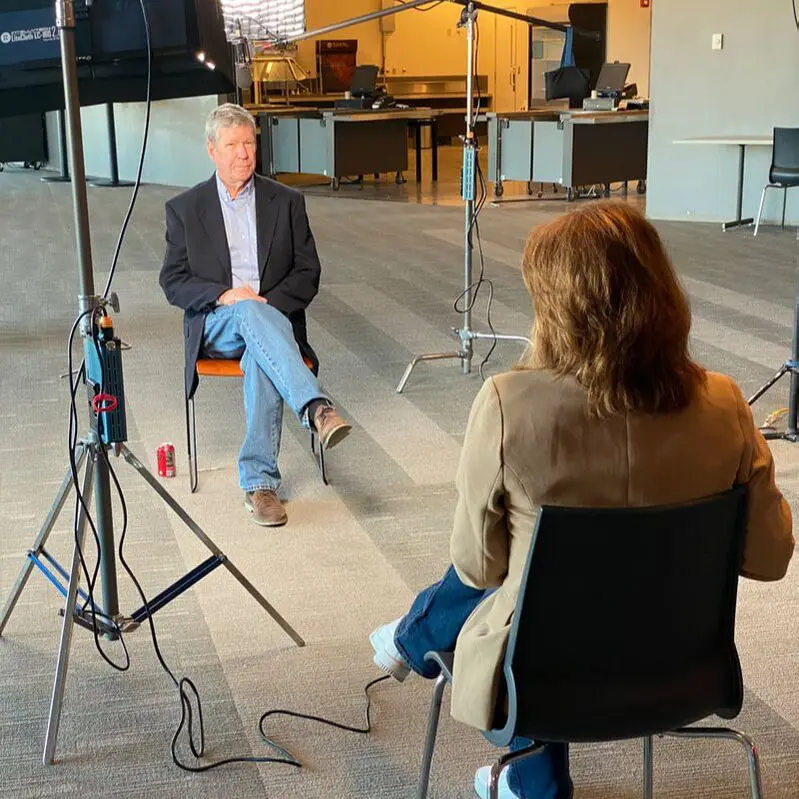 Interview setup with two people seated
