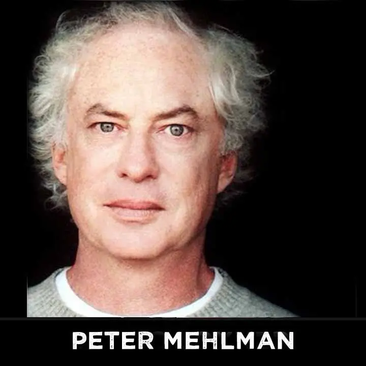 Portrait of man in gray sweater